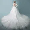 Nya lager ruffle kjolar rygglösa bröllopsklänningar illusion långa ärmar applicerade bollklänningar brud bröllopsklänningar dh412