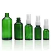 Bottiglie per bottiglie di vetro verde con spruzzatore a pompa per nebulizzazione fine nero progettato per oli essenziali profumi prodotti per la pulizia bottiglie per aromaterapia