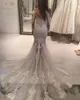 Sexig sjöjungfru spetsbröllopsklänningar med rena halsringningsapplikationer illusion långärmade bröllopsklänning se genom tyll lång tåg brud 223u