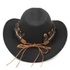 Men de mode Femmes laine Blend Western Cowboy Jazz Hat Wide Brim Sombrero Godfather Cap Caps Cowgirl Feather Band avec Skull1053941