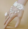 Hot Style Bride Koreansk version av kvinnlig bröllopsklänning Tillbehör Prinsessan Tjej Vit Rose Pearl Lace Armband Band Ring Fashion Classic El