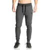 Nya Trend Men Full Sportswear Pants Casual Elastic Mens Fitness Workout Pants Mannes Skinny Sweatpants Byxor Jogger Pants259w