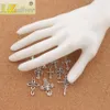 100 adet / grup Sevimli Çiçek Tasarım Çapraz Charm Boncuk 10styles Mic Tibet Gümüş Kolye Takı DIY Bulgular Bileşenleri LM45