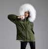 Meifeng marque 100% fourrure de lapin blanc doublée armée vert toile mini vestes parka en fourrure de neige manteaux de style court pour femmes avec garniture en fourrure de raton laveur