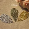 Intera vendita50 pezzi di ciondoli a forma di fiore in filigrana a forma di goccia realizzati con stampaggio in metallo, 22 * 38mm, colore oro / colore argento / bronzo color acciaio