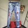 Großhandels-Neu angekommene Sommermode 2017 Jeans mit Stickerei Blumen Druck Bleistift Hosen Jeans Hochwertige Jeans Frau Skinny Denim