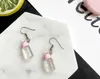 Si mignon belle Transparent Simulation mangeoire biberons balancent boucles d'oreilles pour femmes dame mode bijoux été boucle d'oreille