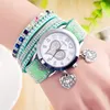 Relojes de la pulsera de las mujeres Moda del estudiante de la personalidad Personalidad en forma de corazón Blindado de dos anillos Wirtwatch