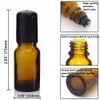 12 neue 10-ml-Rollflaschen aus bernsteinfarbenem Glas mit Edelstahl-Rollkugel und schwarzem Deckel für die Aromatherapie von Parfüm und ätherischen Ölen