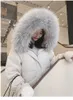 2019 Vinter Nya Kvinnors Stora Raccoon Fur Hooded Loose Palazzo Vit Duck Down Padded Midi Long Parkas Down Coat Casacos SMLXL