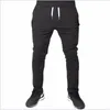 Running byxor män elastiska pojkar fitness träning kläder sport sweatspants jogger röd skinny mens gymbyxor