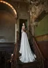 Blygsam en linje maisonsignore bohemiska klänningar juvel nacke långärmad applique spets ihåliga bröllopsklänningar sopa tåg robe de mariée