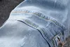 Ny ankomst Mens Designer Jeans Zipper Fold Patch Medal Fashion Mens Jeans Slim Motorcykel Biker Hip Hop Pants Toppkvalitetsstorlek 28272S