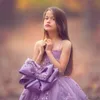 Jolie princesse spaghetti fleurie robes de girl floral appliques en tulle perle pulle première robe de communion avec des robes de concours de filles à gros arc 0505