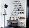 Metallhylla på väggen kreativ järnkonst sovrum möbler hängande triangulär dekorativt clapboard blomma rack