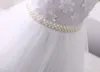 2019 New Lovey Ball Princess Flower Girl Dresses Beaded First Communion Klänningar För Flickor Ärmlös Tulle Pagant Party Dresses FG60