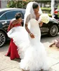 2020 African Black Girl Mermaid Wedding Dresses Sweetheart Lace Appliques Sleeveless Ruffles Tiered Organza Backless Plus Size Bridal Gowns