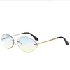 Nuovi occhiali da sole ovali per donna Occhiali da sole con lenti da taglio a diamante senza montatura Occhiali da sole femminili Oceano Chiaro viola Lenti lentes de sol2537092281c