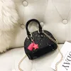 Luno Wallet Kids Handbags أحدث رضيع الفتيات Mini Princess يمارس الأزياء الأزياء المرسلة المصغرة قذيفة عبر الجسم أكياس وجبات خفيفة هدايا عيد ميلاد