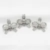 10 pièces argent nœud papillon perle Cage médaillons pendentif pour parfum huile essentielle diffuseur collier parfumé fabrication de bijoux