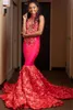 Afryki Halter Prom Dresses z aplikacjami 3D Koronki Koraliki Cekiny Kyehole Neck Syrenka Suknia Wieczorowa Kwiat Train Suknie Arabskie Party