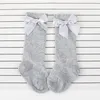 INS Girls Princess Ribbon Bows Calcetines Niños recién nacidos Infant Big Bow Rodilla Medias largas Niños Algodón Lace Ruffle Calcetines para bebés E3602