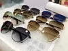 Luxo-novos óculos de sol de grandes dimensões Metal Circular Circular Glass de designer masculino Materiais de ouro anti-UV400 copos e shell8638902