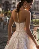 Vestidos de novia con cuentas de encaje de moda Sheer Bateau Neck Botones cubiertos Vestidos de novia A Line Sweep Train Tulle robe de mari￩e