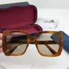 Occhiali da sole da donna di design di lusso 0418 montatura quadrata semplice stile tinta unita occhiali di vendita di alta qualità occhiali di protezione UV400 con scatola