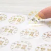 Gold foil translucent label clear transparent adhesive labels custom customer logo sticker with metal effect