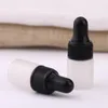 最も人気のあるフロスト2ml 3ml 5mlバイアルガラスドロッパーボトルピペットと黒いプラスチックキャップ付きの小さな空のガラスバイアル