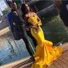 Sexy Yellow Spaghetti Straps Mermaid Prom Dresses Lace Applique Layered Ruffles Backless Floor Length Satin Formal Evening Dresses