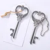 50pcs / lot nyckelformad flasköppnare Keychain Zinc Alloy Key Ring Beer Bottle Opener Unique Creative Wedding Party Gift Favorit