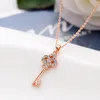 Högkvalitativ 18k Rose Gold Plated Alloy Star / Heart / Key / Crown Pendant Halsband för gåva