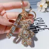 Luksusowy kreskówka słodki miś kryształ Rhinestone Bling brelok projektant unisex breloczek wisiorek brelok ze stali nierdzewnej akcesoria do toreb