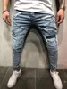 Mode broek ontwerper heren denim blauwe jeans gescheurd slim fit noodlijdende gaten potlood broek mager lang ontwerper Pantalones2232