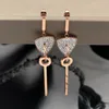 2019 nova moda completa diamante escudo coração piercing anel pendurado chave rosa ouro orelha lama unha lama diamante brincos de coração