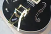 Vänsterhänt semi-ihålig kropp Golden Hardware 2 Pickups Elektrisk gitarr med Big Tremolo Bridge, Rosewood Fingerboard, kan anpassas