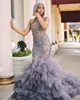 Bedövning Beaded Mermaid Backless Prom Dresses Halter Neck Appliqued Sequined Evening Gowns Sweep Train Tulle Ruffled Formell Dress