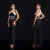 2020 Vit och svart kväll Jumpsuit halter ärmlös chiffong kvällsklänning formell elegant ihålig rygg skräddarsydd festklänning
