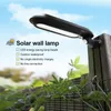 18 LED 500LM太陽壁ランプ防水屋外照明ガーデンランドスケープランプLED人体センサー太陽壁面ライトを導きました