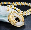 Sha Jin Guan Dou Shuanglong Cat Eye Collana di giada dorata da uomo Imitazione Hetian Yu Pingan Catena lunga placcata oro maglione259U