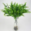 Künstliche Blumen mit Blattgrün Gras Kunststoff Pflanzen Gefälschte Blattlaub Bush für Home Hochzeit Dekoration Party Supplies