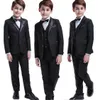 Ropa formal popular de alta calidad para niños Solapa con muescas Negro Tres piezas (chaqueta + pantalón + chaleco) Esmoquin de boda para niños