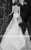 セクシーな背中のないチャペルの列車Vネックマーメイドのウェディングドレスレースパールビーズ長袖の眺めヴェストディデノイバ花嫁のドレス
