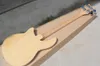 Guitare de basse électrique en bois semihollow en usine.