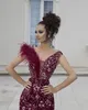 Luxury Feather Burgundy Mermaid Evening Dresses Slitage Axel V Neck Lace Appliques Crystal Beaded Sweep Train Sheer Party Prom Crows