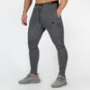 Mens Jogger Fitness Calças Casuais Estiramento Algodão Mens Fitness Exercício Bordado Calças De Esportes Calças Jogging Asiático Tamanho M-2XL