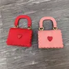 Mor och barn handväskor 2019 het försäljning mode koreanska tjejer mini prinsessa plånböcker härliga hjärta väskor tote kedja cross-body väskor gåvor