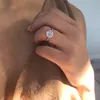 Corte dulce Joyería fina de alta calidad Real 925 Plata de ley Corte redondo Topacio blanco CZ Diamante Piedras preciosas Solitario Mujeres Anillo de boda